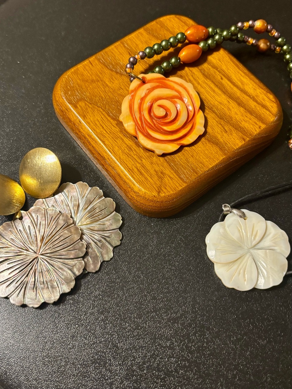 Artisan Carved Floral Mother of Pearl Necklaces & Earrings.